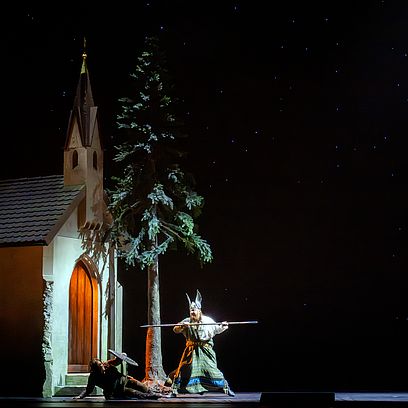 Wotan threatens Br&uuml;nnhilde with his spear.