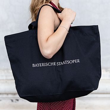 Photo of a black bag with the Opera logo