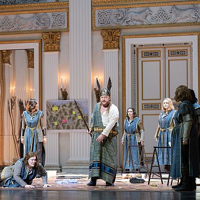 Wotan in Valhalla, which looks like the Royal Hall of the National Theater.