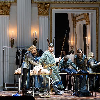 Wotan in Valhalla, which looks like the Royal Hall of the National Theater.