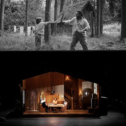 Hunding, Siegmund, and Sieglinde are in a hut. On a screen above the stage, Wotan and the young Siegmund are seen in a flashback.
